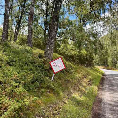 EuroVelo 1 - slow sign along the road in the Scottish Highlands