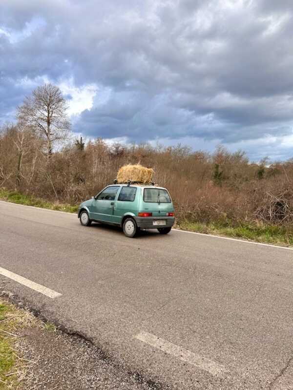 EuroVelo 5 - a Fiat loaded with hay